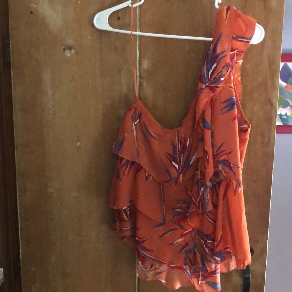 Off the shoulder shirt. Peplum style flowy